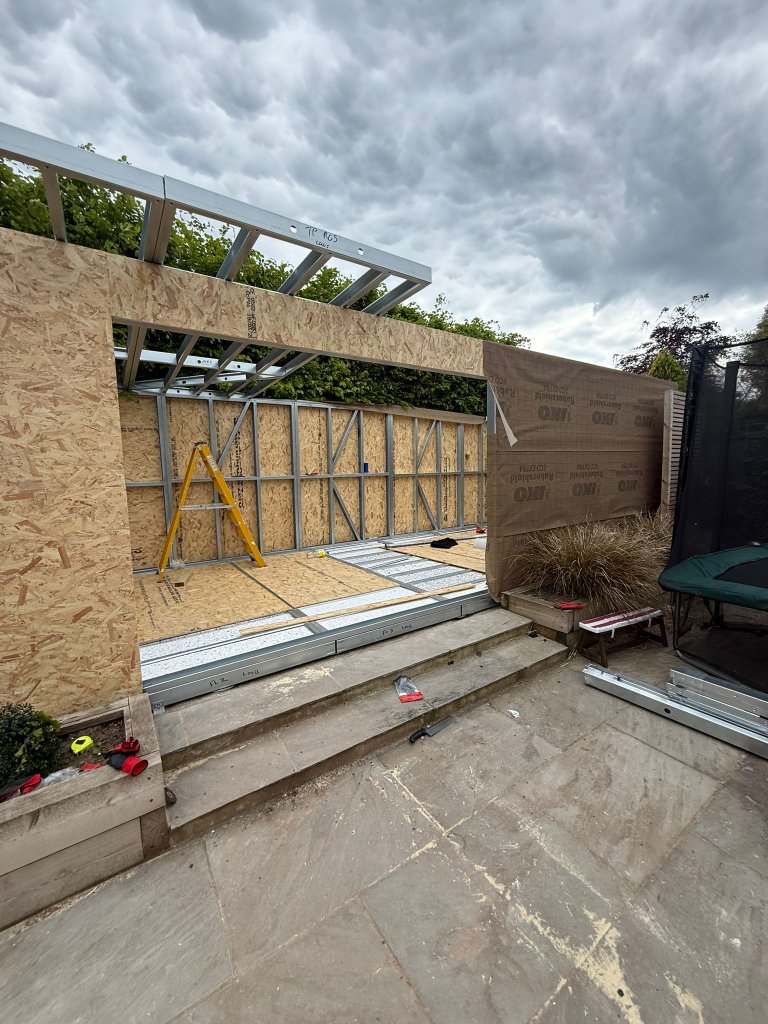 Garden-room foundation and steel-frame erection in Surrey — second site view